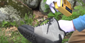 spraying permetherin on hiking boots 
